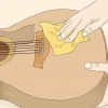 Determinando a idade e o valor de uma guitarra