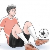 Chutando uma bola de futebol