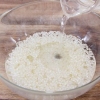 Fazendo arroz tufado