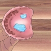 Removendo o adesivo de dentadura das gengivas