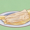 Comer tamales