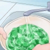 Prepare brotos de samambaia (fiddleheads)