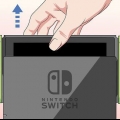 Desdobrar o suporte de um nintendo switch
