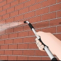 Pintando uma casa de tijolos