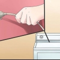 Como tirar uma mancha de tinta de um tambor de secadora