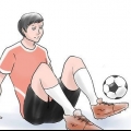 Chutando uma bola de futebol
