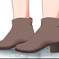 Usando botas de tornozelo