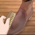 Tingimento de botas de couro