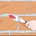 Remoção de argamassa de tijolos