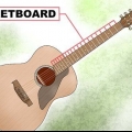 Tocando escalas em uma guitarra