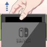 Desdobrar o suporte de um nintendo switch