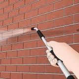 Pintando uma casa de tijolos