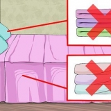 Faça uma cama em estilo hotel