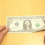 Como dobrar um coração de uma nota