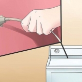 Como tirar uma mancha de tinta de um tambor de secadora