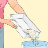 Limpando uma caixa de areia