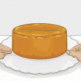 Cubra um bolo com fondant