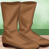 Usar botins com vestidos