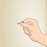 Reparar furos no drywall