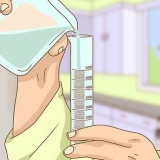 Determinando o volume de um objeto irregular usando um cilindro graduado