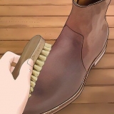 Tingimento de botas de couro