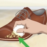 Manutenção de sapatos de couro