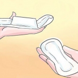 Usando absorventes higiênicos