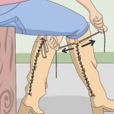 Mantenha suas botas acima do joelho