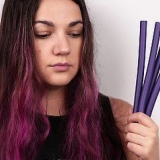 Colocando papillos no cabelo