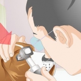 Tirando a sujeira dos olhos do seu cachorro
