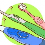 Escovar os dentes