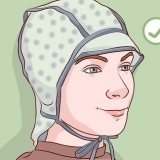Coloque seu cabelo com uma touca de destaque você mesmo