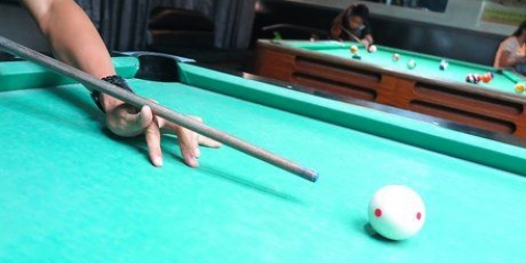 Jogar sinuca de 9 bolas
