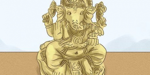 Orando ao deus hindu ganesha