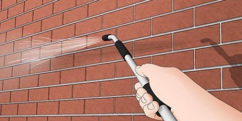 Pintando uma casa de tijolos