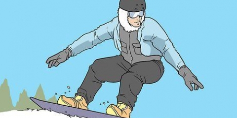 Fazendo um frontside 360 ​​em uma prancha de snowboard