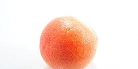 Comer uma toranja