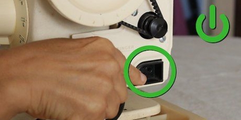 Usando uma máquina de costura