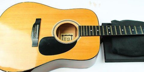 Trocando as cordas da guitarra