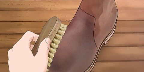 Tingimento de botas de couro
