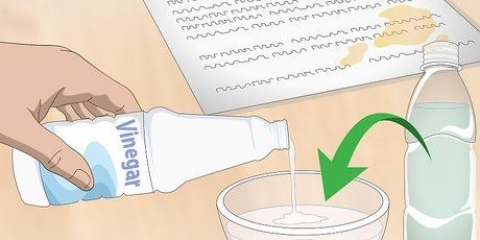 Tirar manchas de óleo do papel