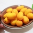 Comer um kumquat