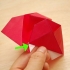 Como dobrar uma rosa de papel