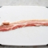 Fazendo salsichas embrulhadas em bacon