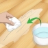 Reparando arranhões em um piso de madeira